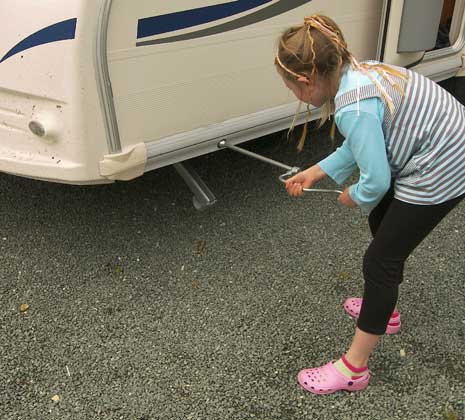 Girl leveling touring caravan